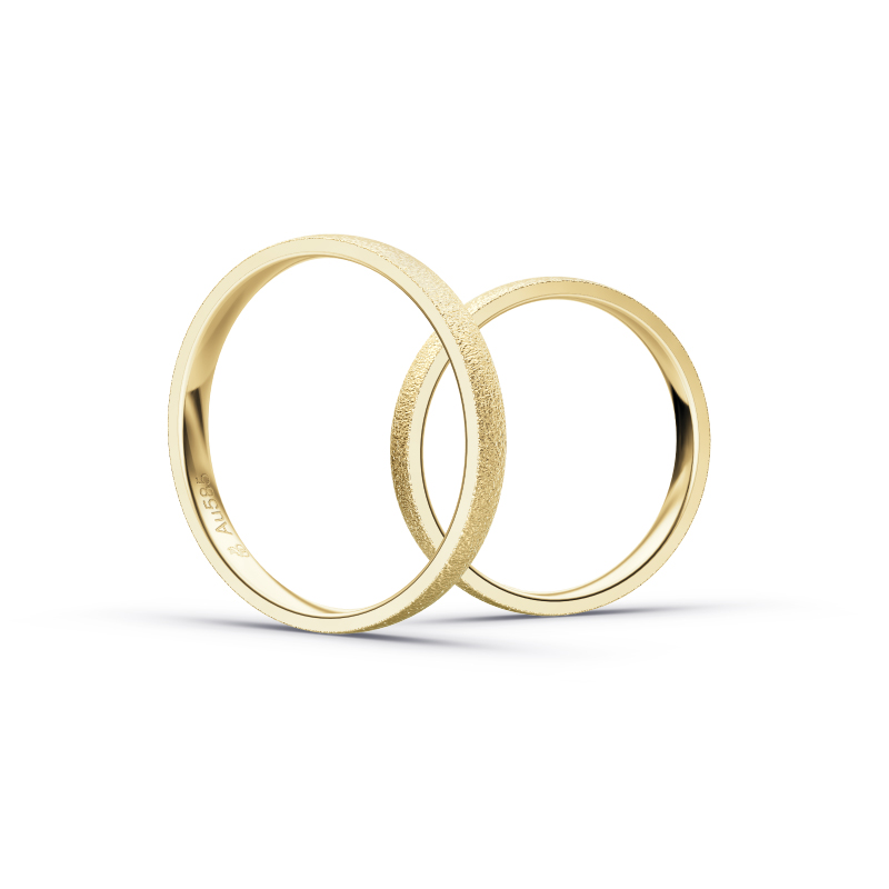 Aufnahme von schmalen Eheringen aus Gelbgold in 2,5 mm Breite mit Diamant und Körnung 