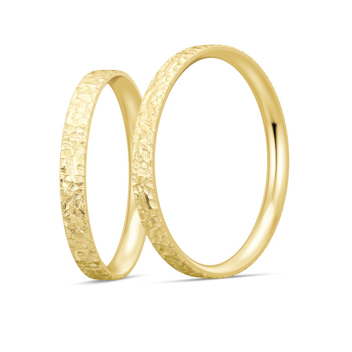 Aufnahme von Eheringen aus Gelbgold mit Diamanten und taktiler Oberfläche