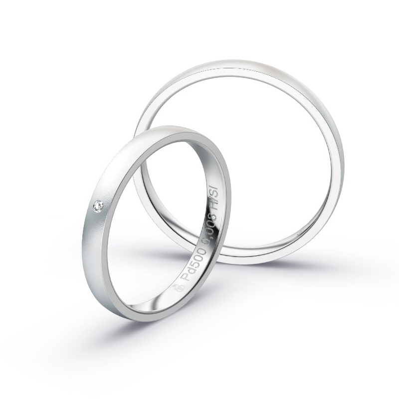 Aufnahme von schmalen Eheringen aus Palladium in 2,5 mm Breite mit Diamant und Sandmattierung