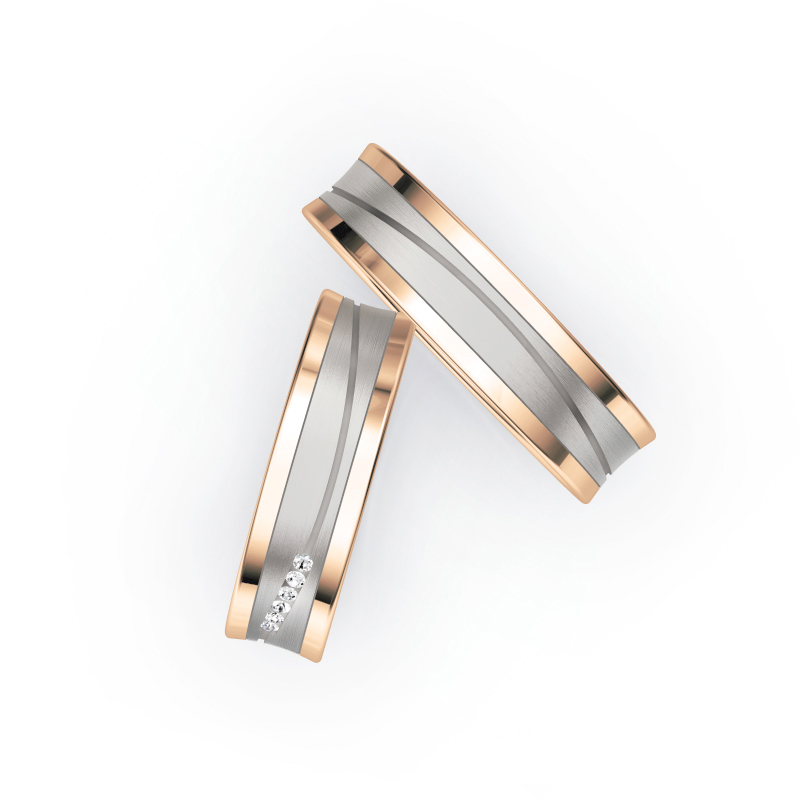 Aufnahme von Eheringen aus Palladium & Roségold leicht konkaver Form mit Diamanten