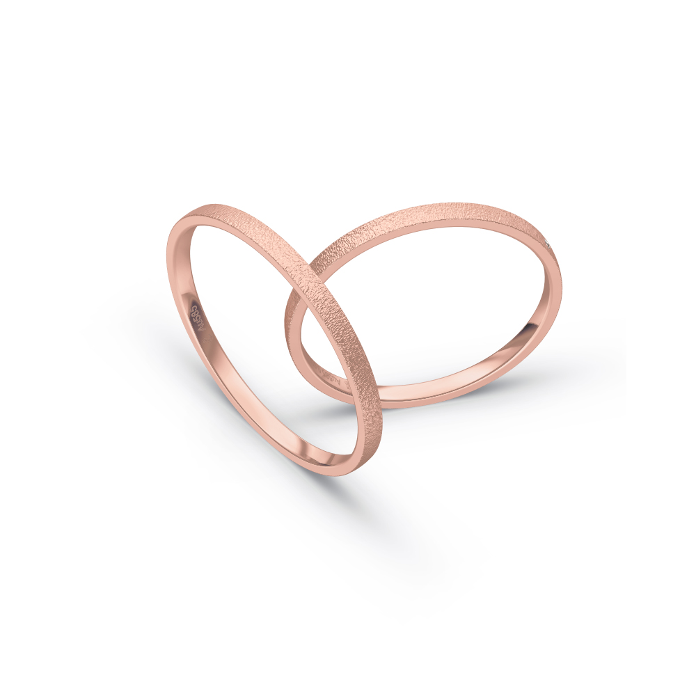 Aufnahme von schmalen Eheringen aus Rosegold in 1,5 mm Breite mit Körnung und Diamant 