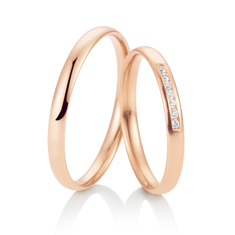 Aufnahme von Roségold Eheringen in schmalem Design mit 7 Diamanten