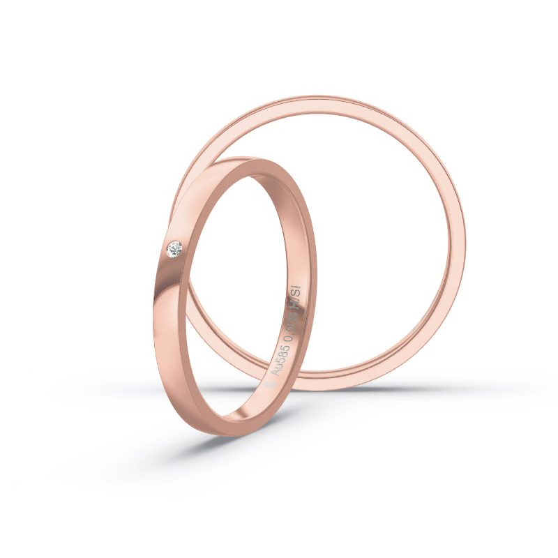 Aufnahme von schmalen Eheringen aus Roségold in 2 mm Breite mit Diamant und Polierung 