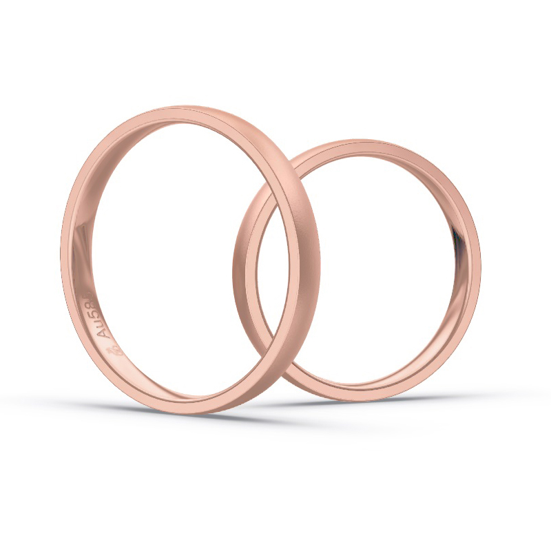 Aufnahme von schmalen Eheringen aus Rosegold in 2,5 mm Breite mit Diamant und Sandmattierung
