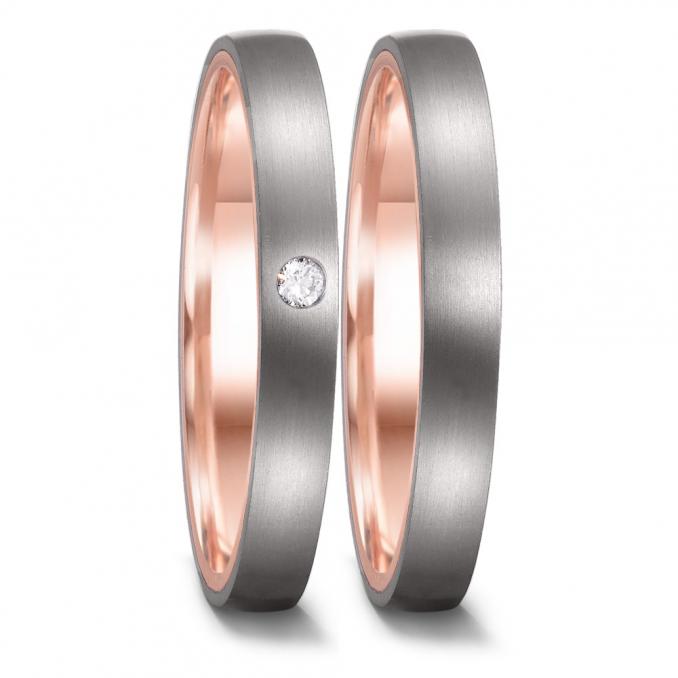 Aufnahme von Eheringen ausTitan mit poliertem 585er Rotgold und Diamanten