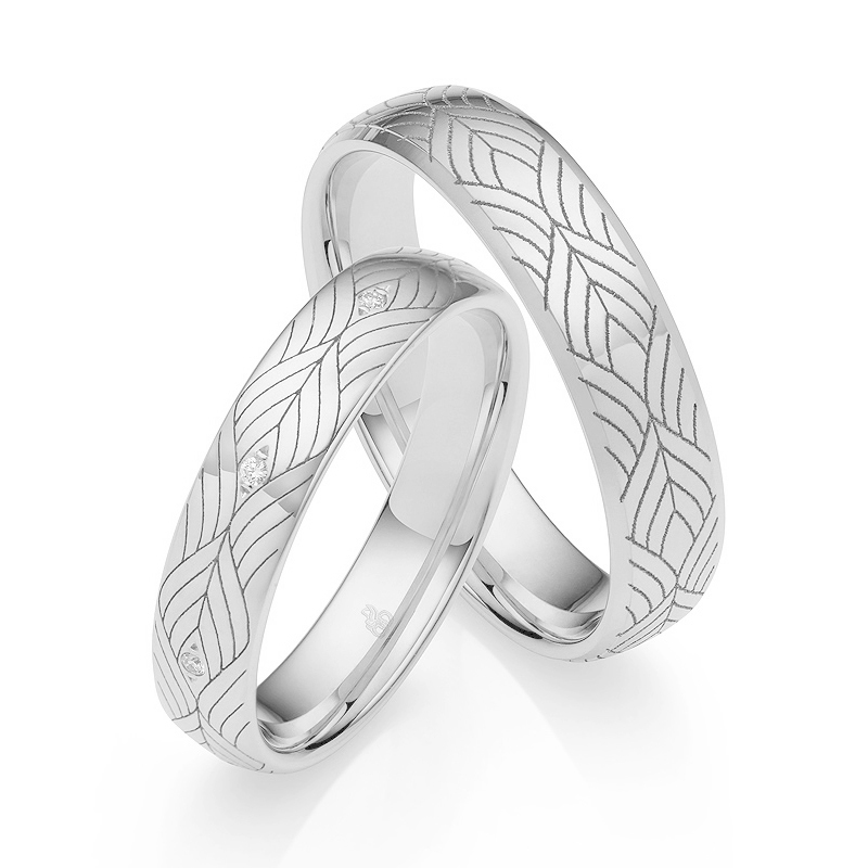 Roségold Eheringe mit Art Deco Design mit 8 Diamanten um Ringschiene