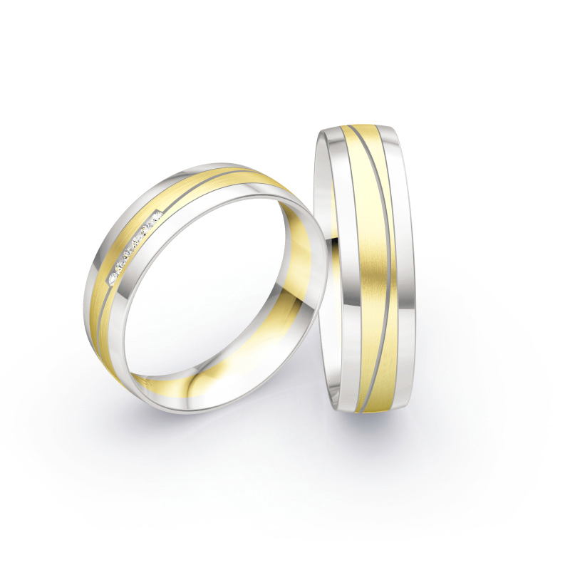 Aufnahme von Eheringen aus Weiß- & Gelbgold mit Diamanten und bicolorem Design 