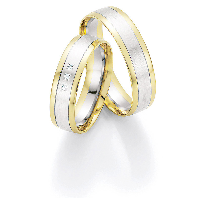 Aufnahme von bicoloren Eheringen aus Weissgold & Gelbgold mit polierten Rändern