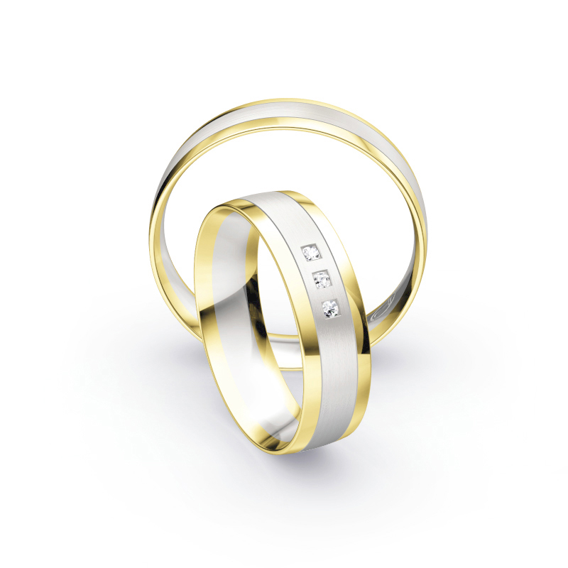 Aufnahme von bicoloren Eheringen aus Weissgold & Gelbgold mit polierten Rändern