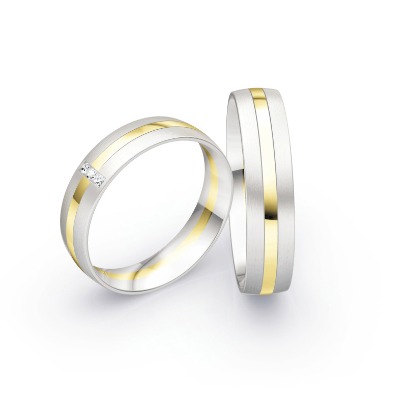 Aufnahme von Eheringen aus Weiß- & Gelbgold mit Diamanten im bicoloren Design matt poliert