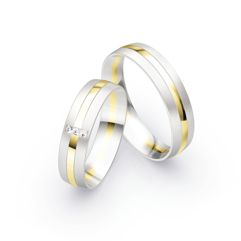 Aufnahme von Eheringen aus Weiß- & Gelbgold mit Diamanten im bicoloren Design matt poliert