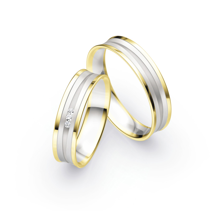 Aufnahme von konkaven Eheringen aus Weiß- & Gelbgold mit Diamanten matt poliert