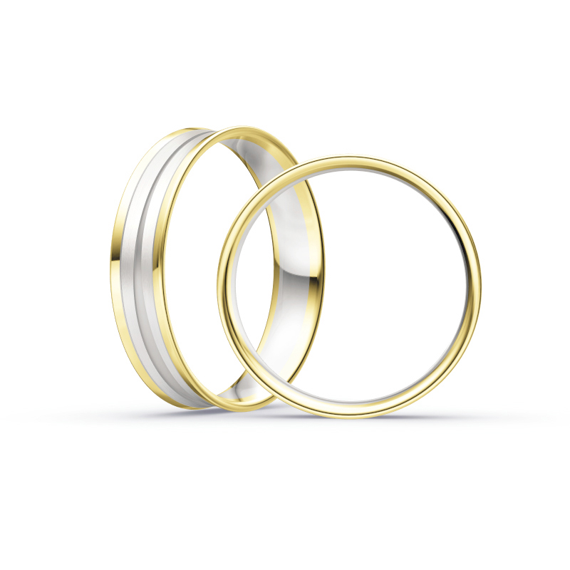 Aufnahme von konkaven Eheringen aus Weiß- & Gelbgold mit Diamanten matt poliert