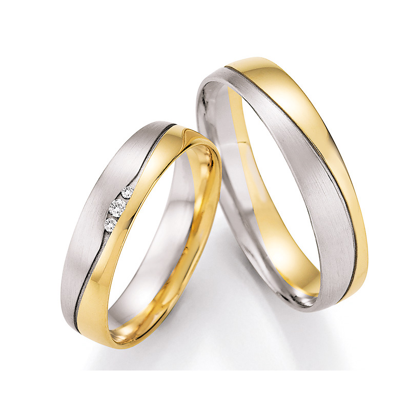 Aufregende Eheringe aus Weiß- & Gelbgold mit Diamanten in ovaler Rille 4560106