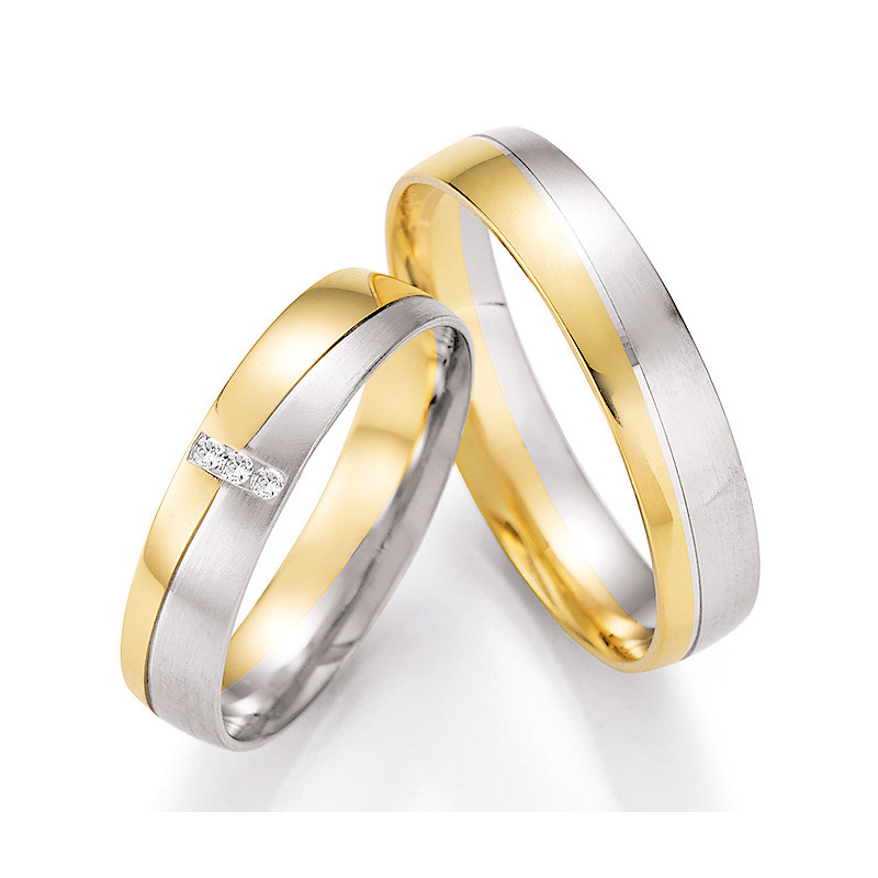 Eindrucksvolle Eheringe aus Weiß- & Gelbgold mit tollen Flächen und Diamanten 4560104