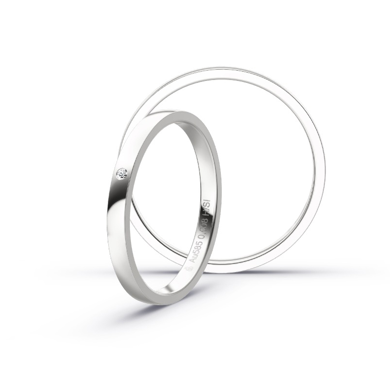 Aufnahme von schmalen Eheringen aus Weißgold in 2 mm Breite mit Diamant und Polierung 