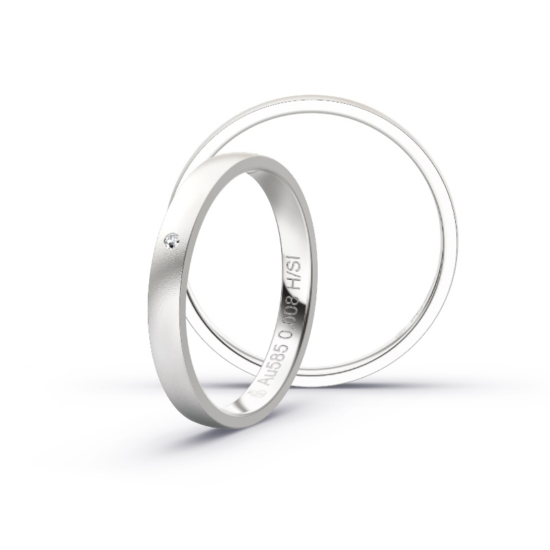 Aufnahme von schmalen Eheringen aus Weissgold in 2,5 mm Breite mit Diamant und Sandmattierung