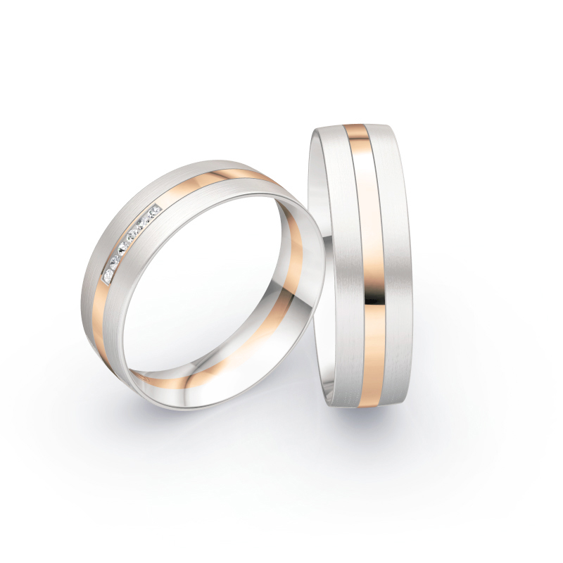 Aufnahme von Eheringen aus Weissgold und Roségold mit Diamanten und matter Oberfläche