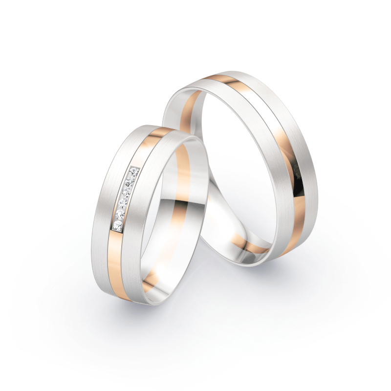 Aufnahme von Eheringen aus Weissgold und Roségold mit Diamanten und matter Oberfläche