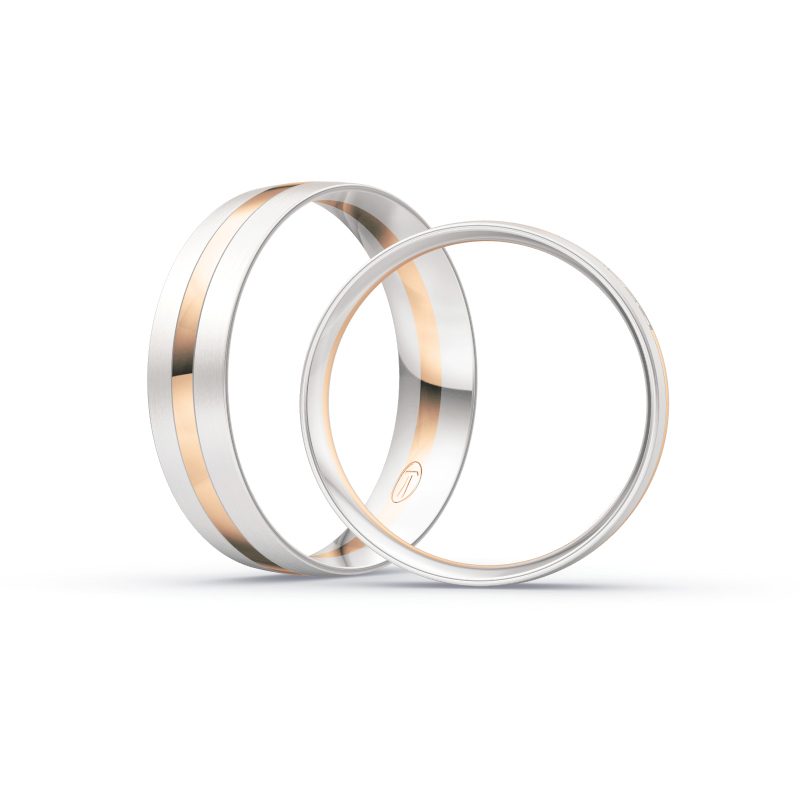 Aufnahme von Eheringen aus Weissgold und Roségold mit Diamanten und matter Oberfläche