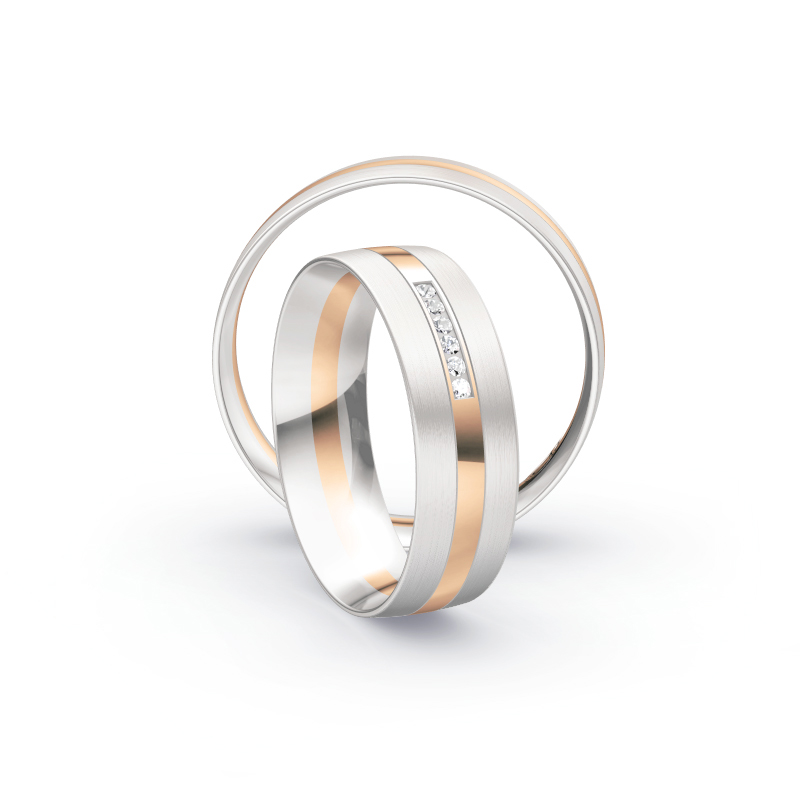 Aufnahme von Eheringen aus Weissgold und Roségold mit Diamanten und matter Oberfläche