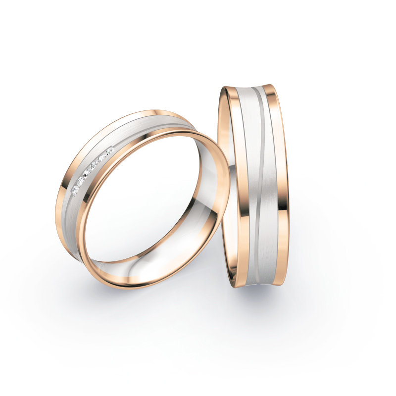 Aufnahme von Eheringen aus Weiß- & Roségold leicht konkaver Form mit Diamanten