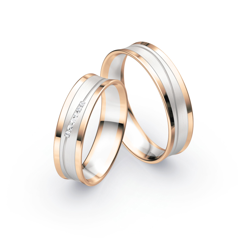 Aufnahme von Eheringen aus Weiß- & Roségold leicht konkaver Form mit Diamanten
