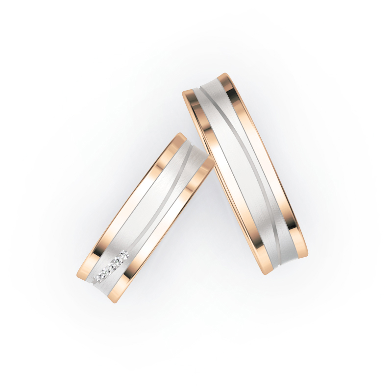 Aufnahme von Eheringen aus Weiß- & Roségold leicht konkaver Form mit Diamanten