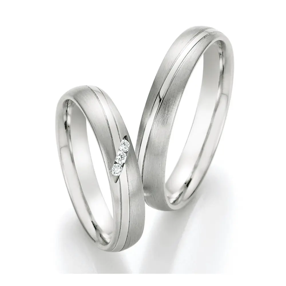 matte und polierte Stahl Trauringe mit Diamanten