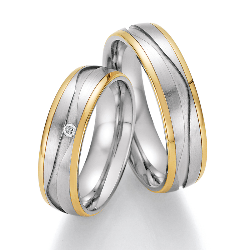 Eheringe Trauringe aus Stahl & Gelbgold mit Diamant Ruesch Collection Nowotny 88/01810-060