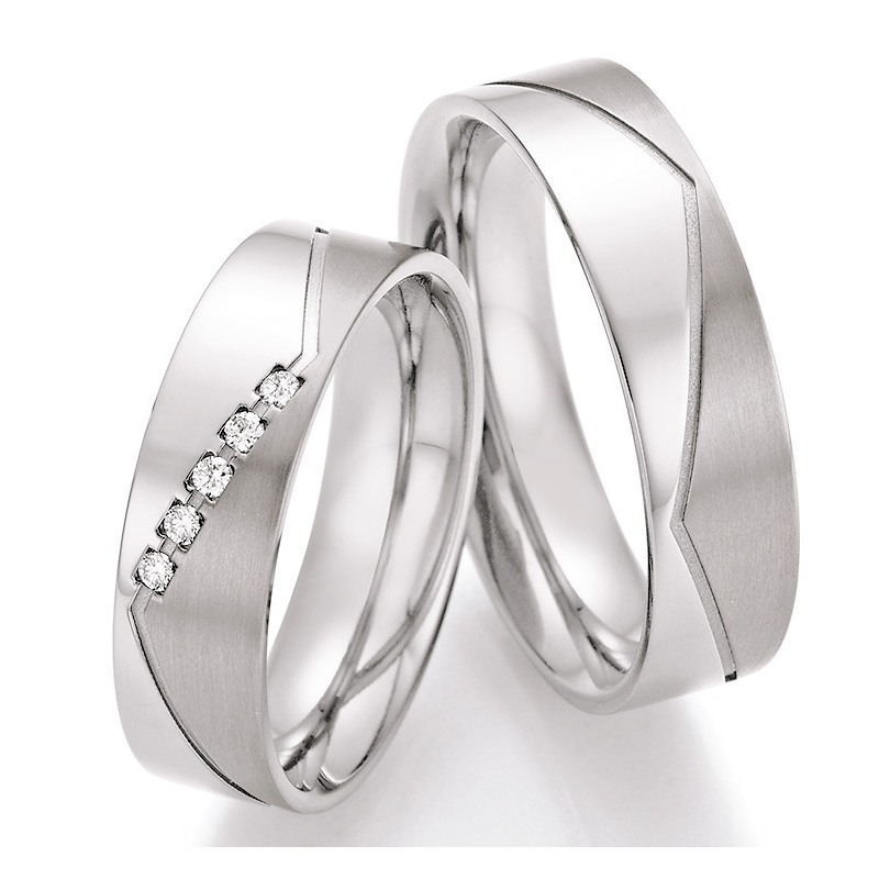 Eheringe Trauringe aus Titan mit Diamant Dreiecksmuster mattiert poliert 6mm Breite Ruesch Collectio
