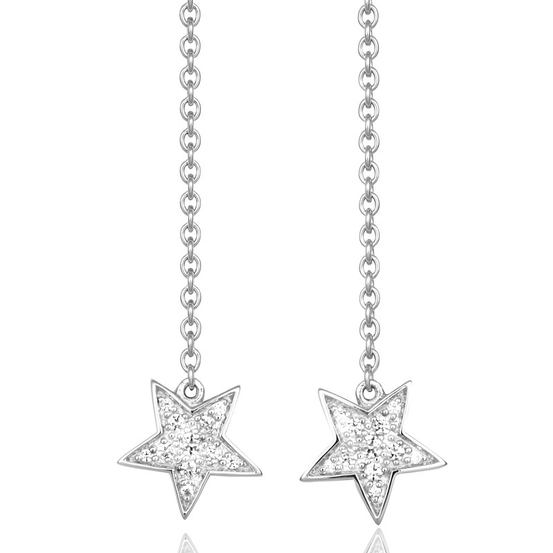 Aufnahme von Ohrhängern aus Gelbgold und Weißgold mit Sterndesign und 22 Diamanten