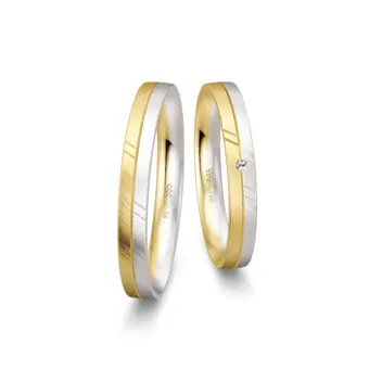 Trauringe aus Gelbgold und Weißgold schmal quermatt mit Diamant