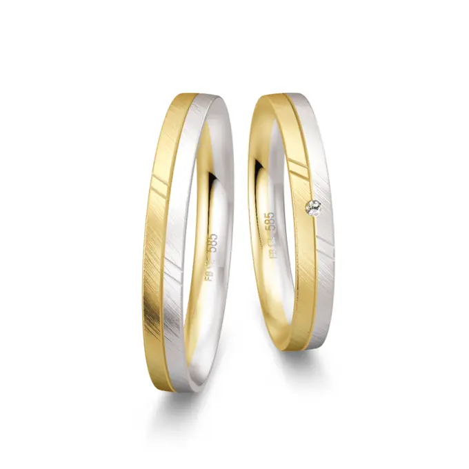 Trauringe aus Gelbgold und Weißgold schmal quermatt mit Diamant