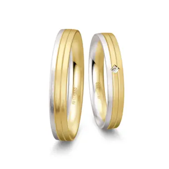 Trauringe aus Gelbgold und Weißgold schmal längsmatt mit Diamant