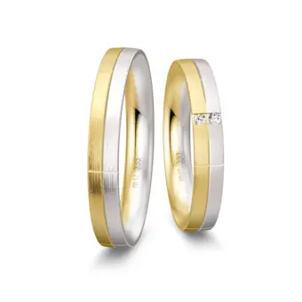 Trauringe aus Gelbgold und Weißgold mattiert mit 2 Diamanten und Rillen
