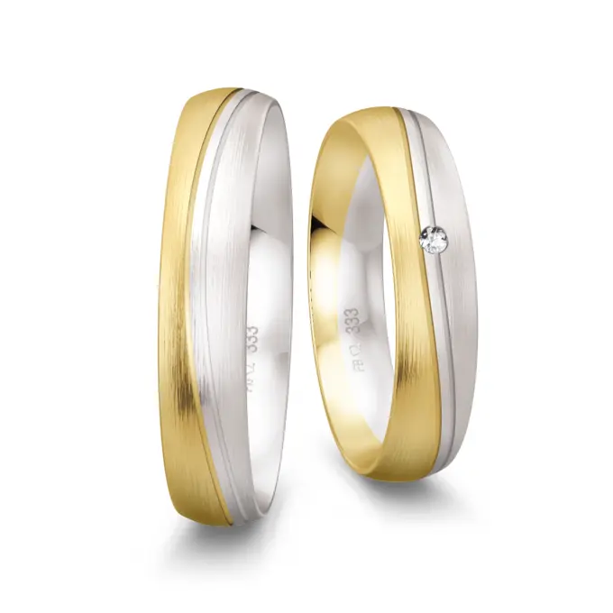 Eheringe aus Gelbgold und Weißgold matt gerundet mit 2 Rillen und Diamant