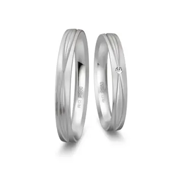 Eheringe aus mattem Platin schmal mit Rillenmuster und Diamant