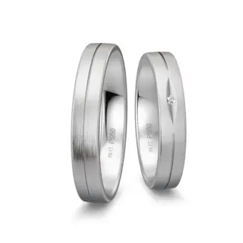 Mattierte Eheringe aus Platin mit Diamanten in augenförmiger Kerbe