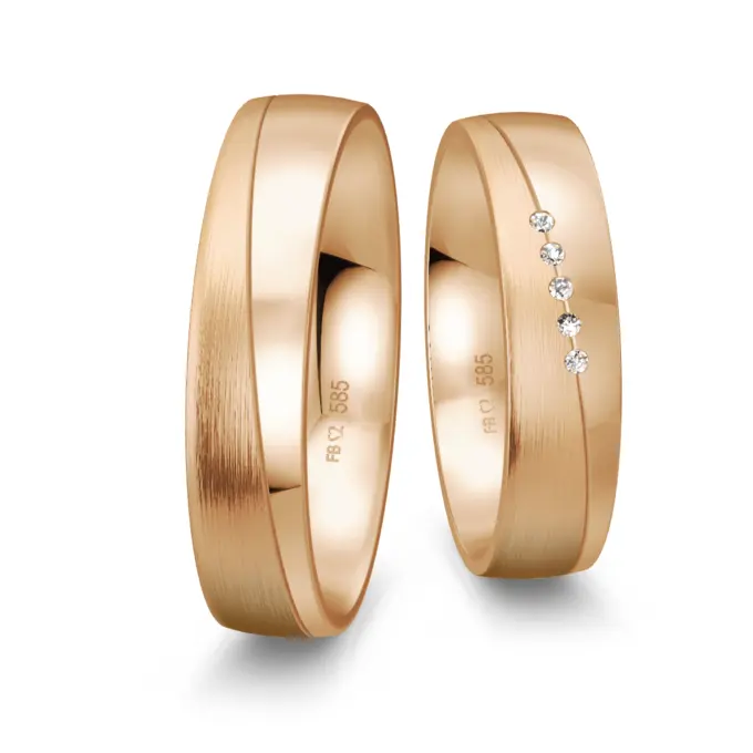 Trauringe aus Roségold mit 5 Diamanten Polierung und Mattierung