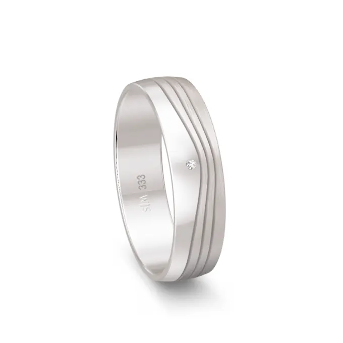 Weissgold Trauring mit Diamant und welligem Rillenmuster