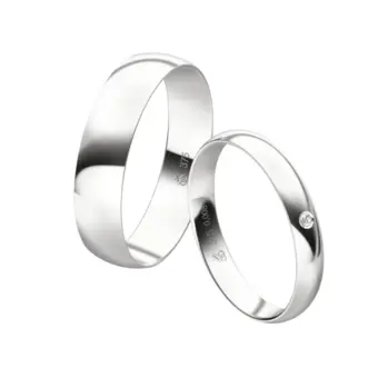 Weißgold Eheringe mit Diamanten in zwei Breiten und Diamant im Damenring