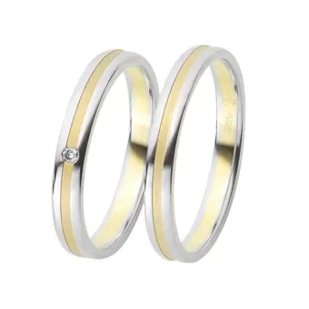 Gelbgold und Weissgold Eheringe mit Diamanten und sandmattem Mittelstreifen