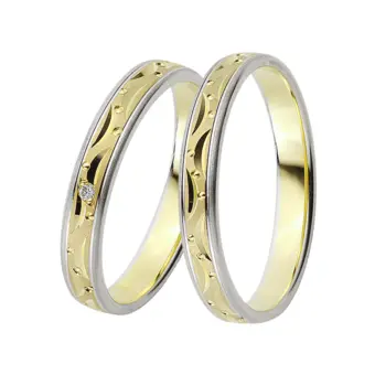 Gelb-&Weissgold Eheringe mit Mustern aus Kreisen und Halbmonden und Diamant
