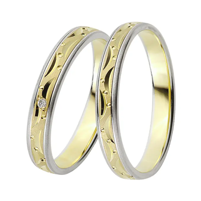 Gelb-&Weissgold Eheringe mit Mustern aus Kreisen und Halbmonden und Diamant