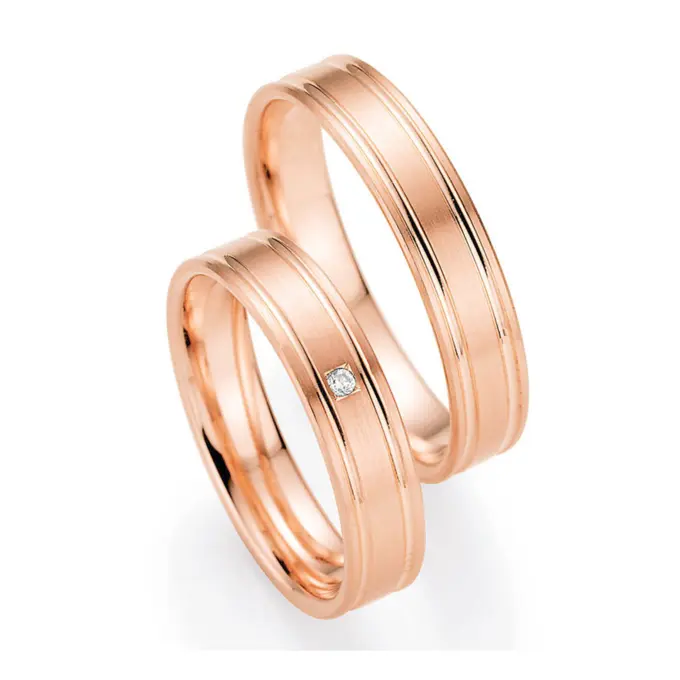 Rotgold Eheringe mit zwei Rillen und Diamanten