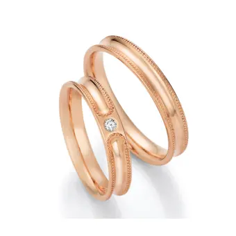 Rotgold Eheringe konkav mit Millgriff und Diamanten