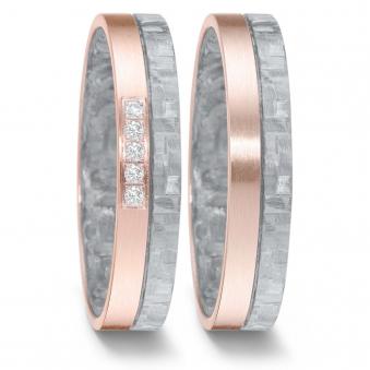 Frontale Aufnahme von schmalen bicoloren Trauringe aus grauem Carbon & Roségold mit 5 Diamanten