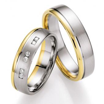 Aufnahme von Gelbgold/Palladium 500 Eheringen mit Rille und sechs Diamanten
