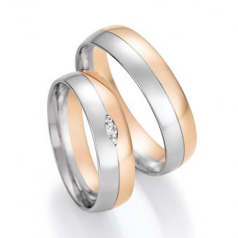 Aufnahme von Trauringen aus Palladium 500/Roségold hochpoliert mit 3 Diamanten